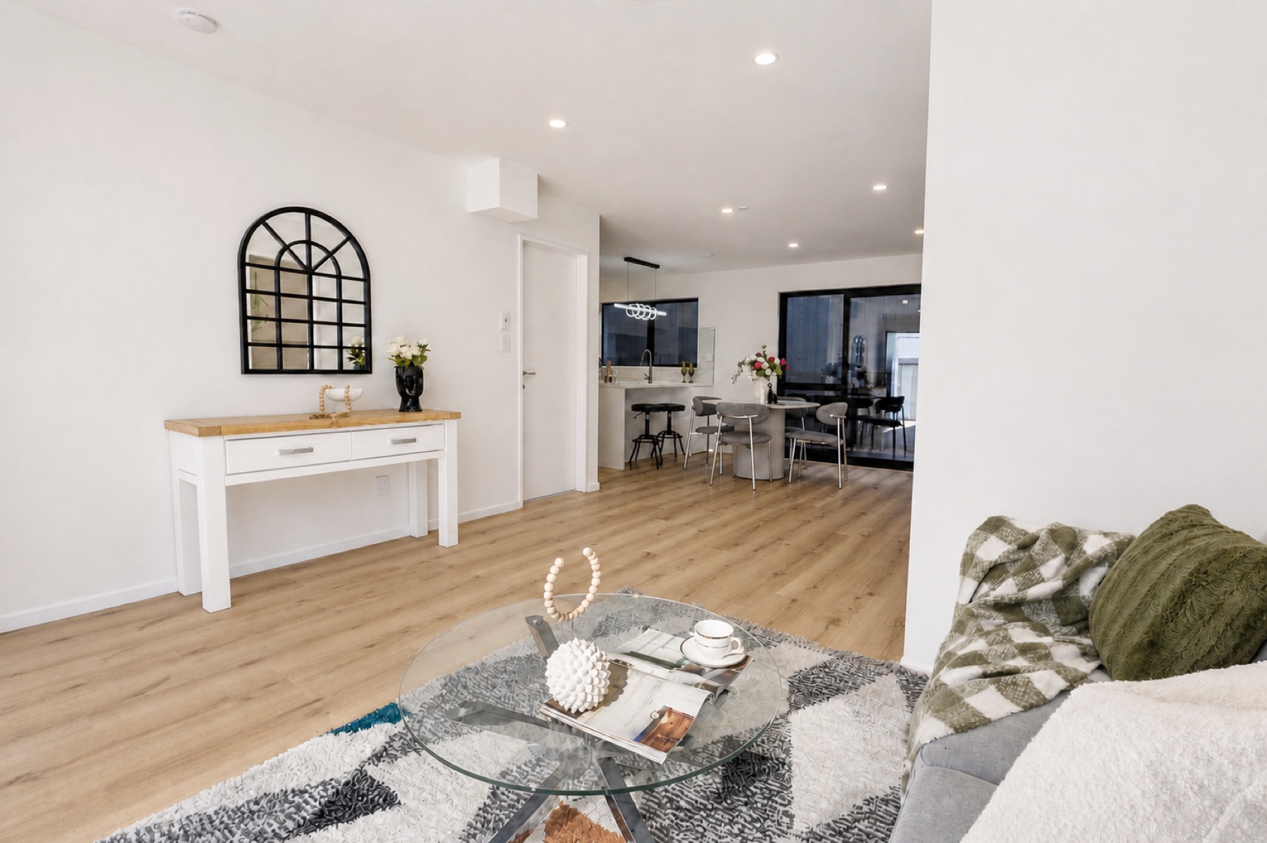 Living and dining at 9 Kaikoura Street, Henderson