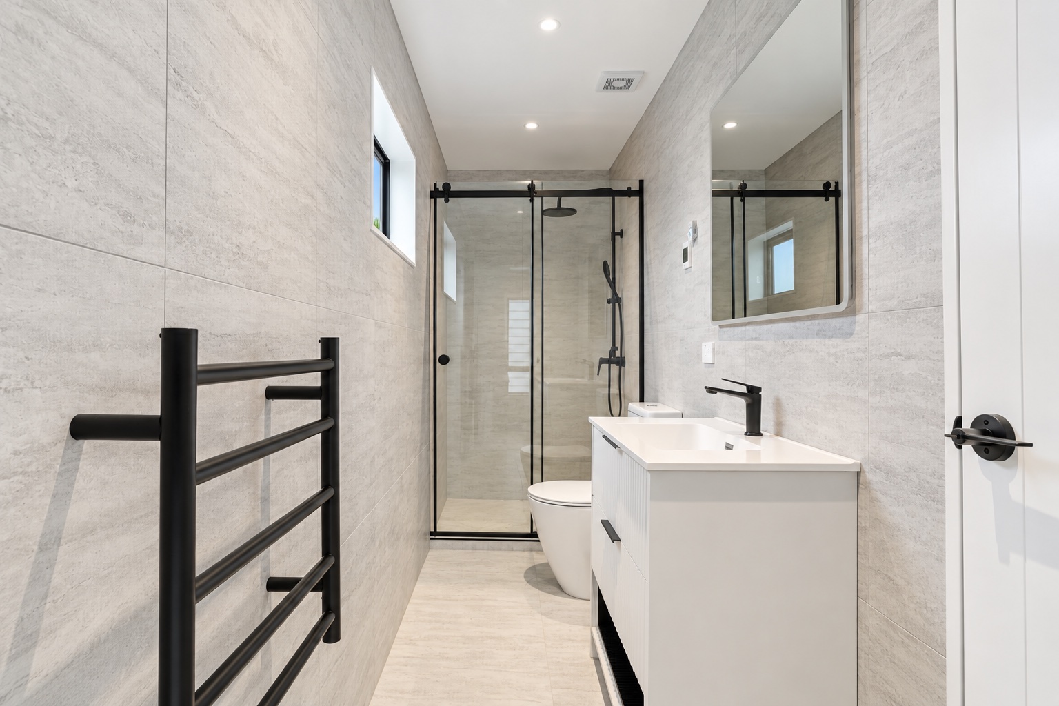 Bathroom vanity and glass shower